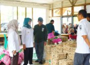 Wabup Dharmasraya, Leli Arni, membuka Gelar Pangan Murah di Sungai Duo
