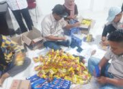 KONI Pessel Salurkan 114 Paket Sembako untuk Korban Banjir di Bayang