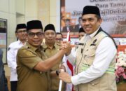 Sambut PDG 11 di Debarkasi, Wabup Pessel Minta Jemaah Jadi Teladan bagi Masyarakat